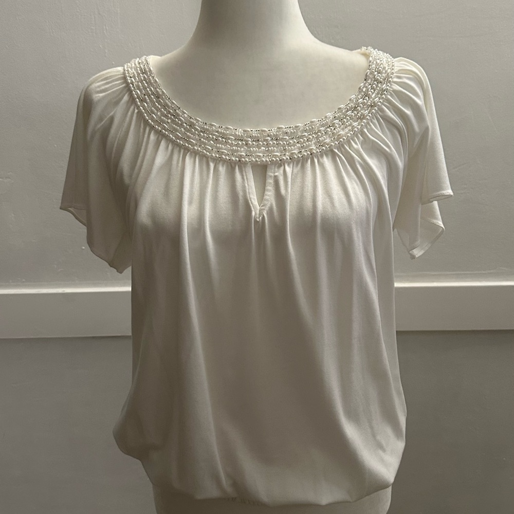 Like new! White top. Medium. Beautiful. Beaded embellishments.